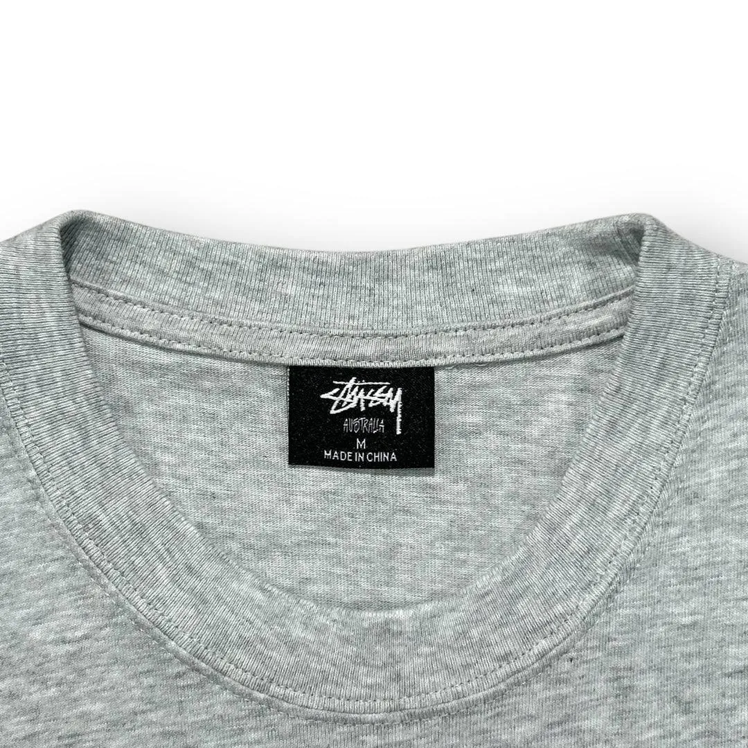 Stssy Grey T-shirt with Pink Dice Graphic